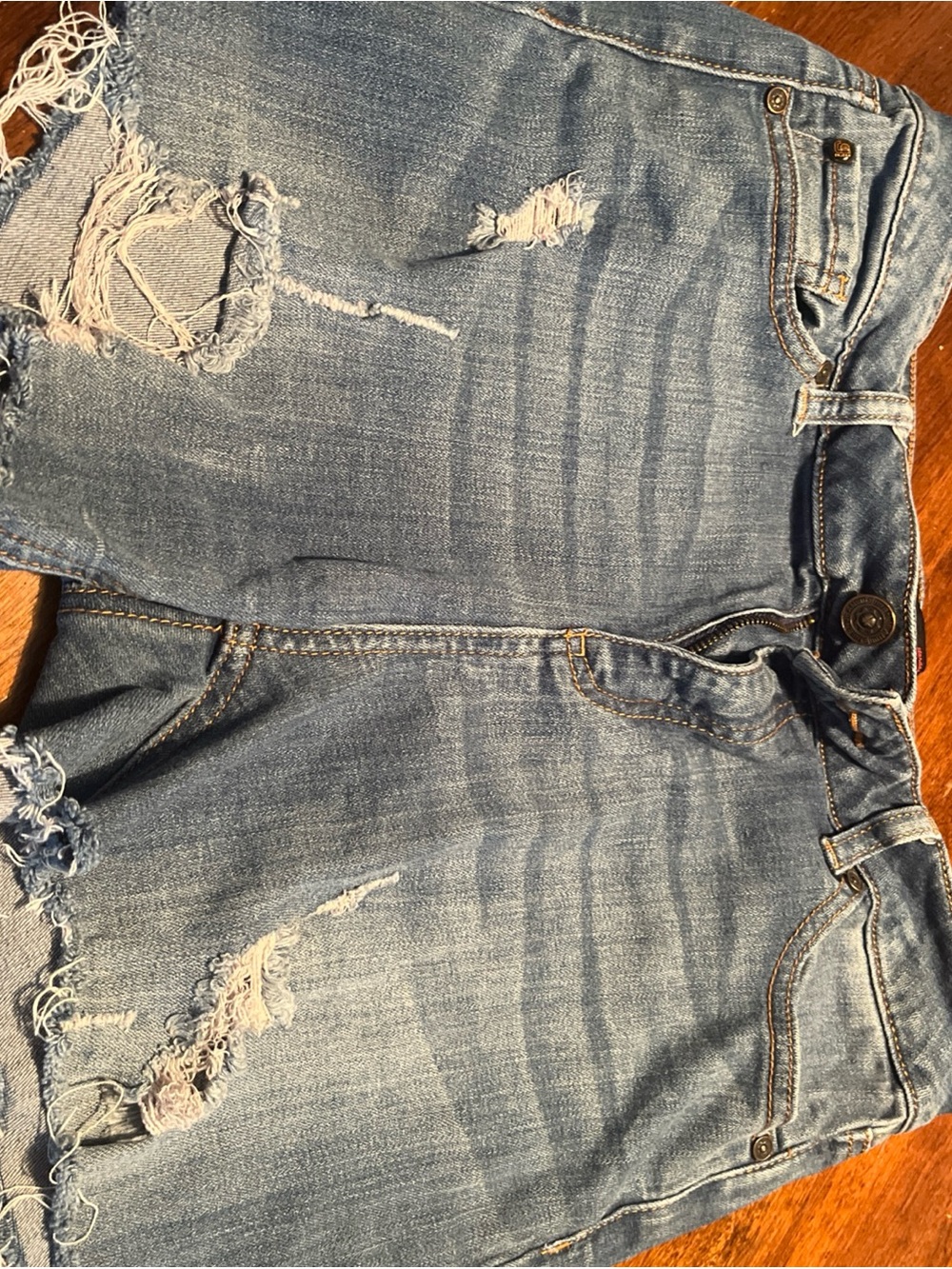 Women’s Light Blue Distressed Denim Shorts